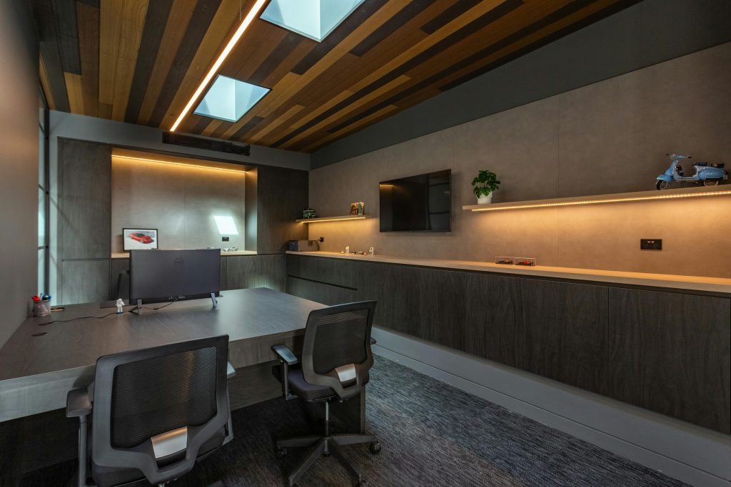 Stylish and contemporary office interior with chic furniture and ambient lighting.